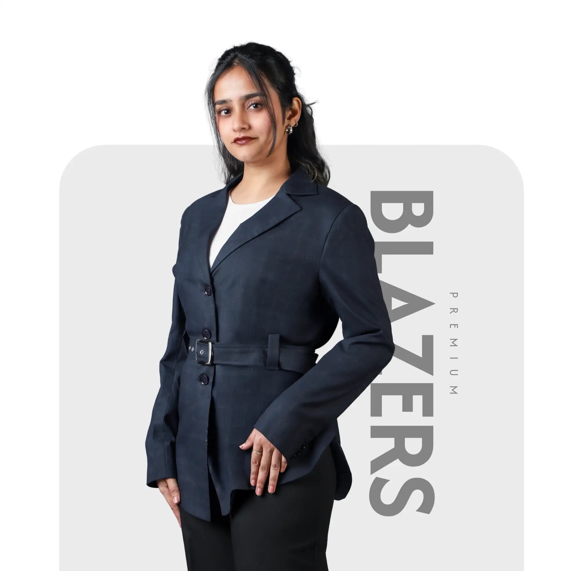 Navy blue blazer with a belted waist and structured shoulders